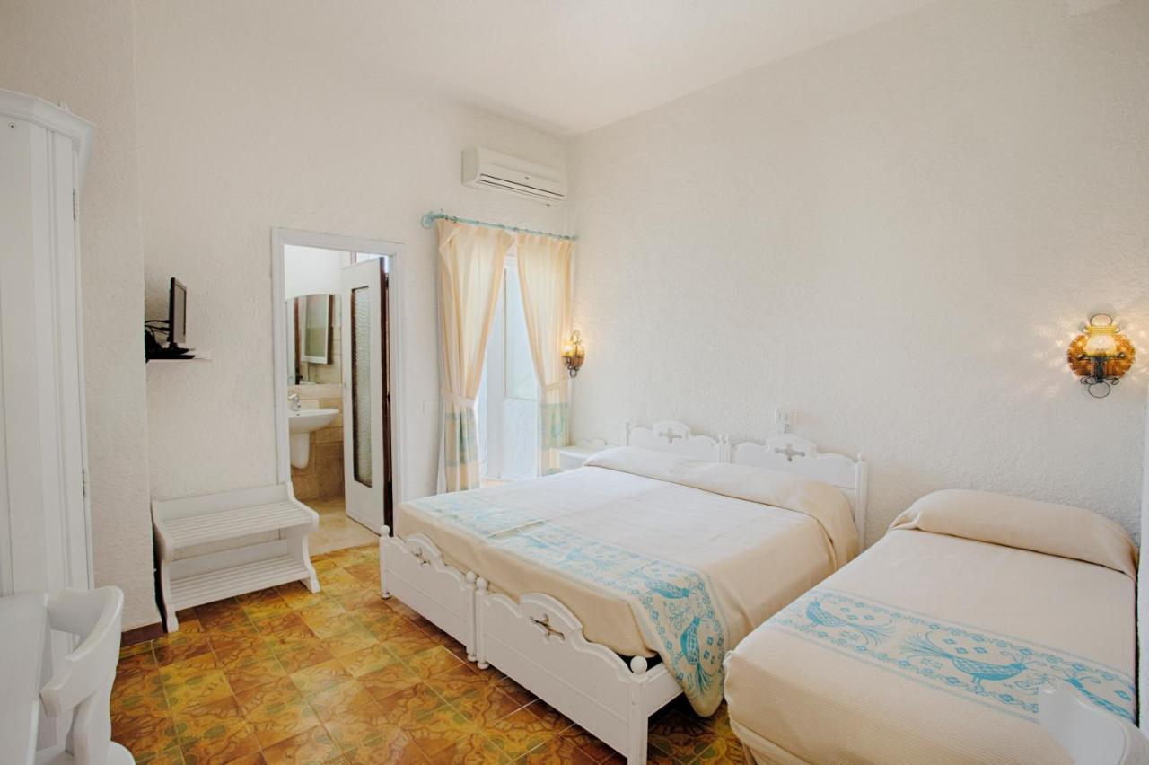 Hotel Al Faro Сан-Теодоро Экстерьер фото