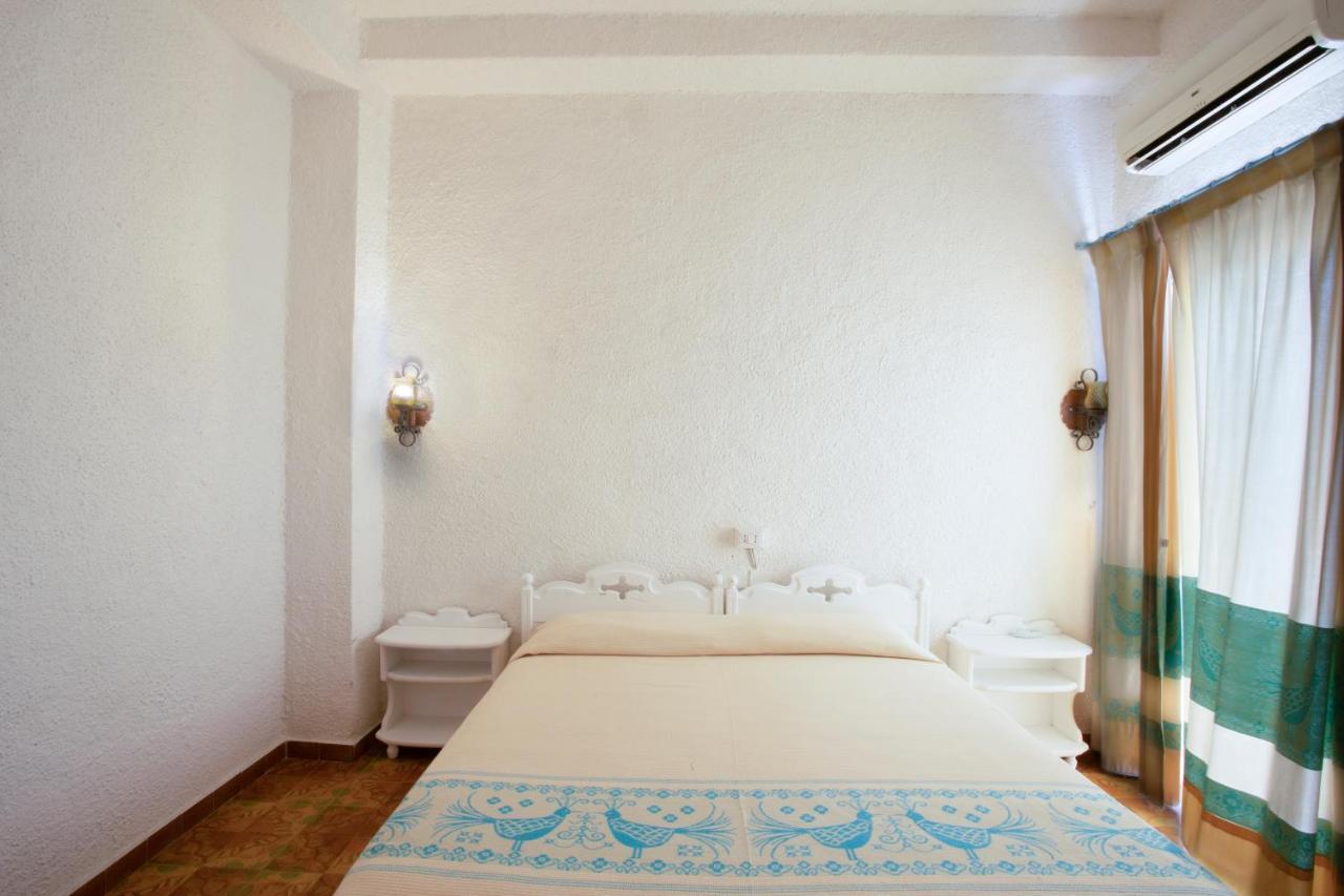 Hotel Al Faro Сан-Теодоро Экстерьер фото